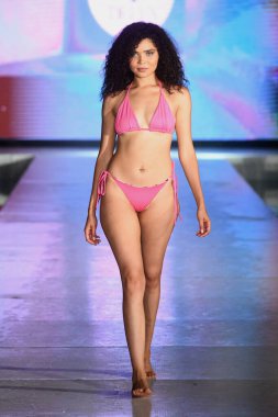 MIAMI BEACH, FLORIDA - JULY 08: A model walks the runway for DELYX LTD Show during Miami Swim Week The Shows powered by DCSW on July 08, 2021 in Miami Beach, Florida