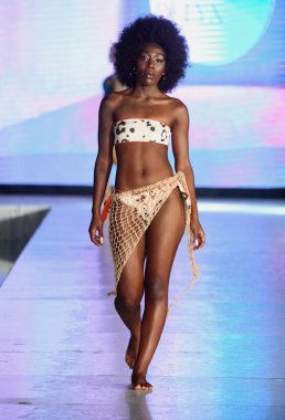 MIAMI BEACH, FLORIDA - JULY 08: A model walks the runway for DELYX LTD Show during Miami Swim Week The Shows powered by DCSW on July 08, 2021 in Miami Beach, Florida