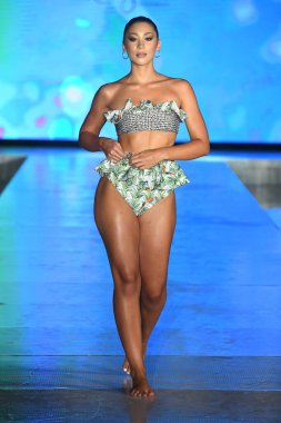 MIAMI BEACH, FLORIDA - JULY 08: A model walks the runway  for Lia Sahara Show during Miami Swim Week The Shows powered by DCSW on July 08, 2021 in Miami Beach, Florida