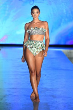 MIAMI BEACH, FLORIDA - JULY 08: A model walks the runway  for Lia Sahara Show during Miami Swim Week The Shows powered by DCSW on July 08, 2021 in Miami Beach, Florida