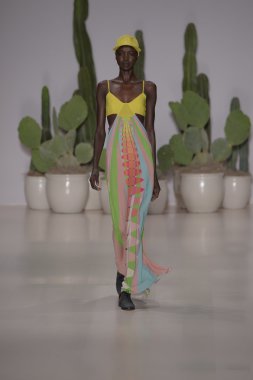 Model walks the runway at the Mara Hoffman Spring-Summer 2015 Collectio clipart