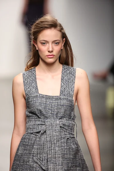 Model walks the runway at Karen Walker Spring-Summer 2015 fashion show — стокове фото