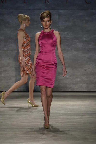 Model walks the runway at the B. Michael America fashion show
