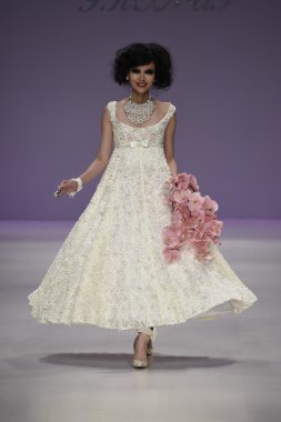 Model walks the runway at Betsey Johnson fashion show clipart