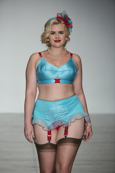 Model walks runway wearing Secrets in Lace lingerie Spring 2015 collection