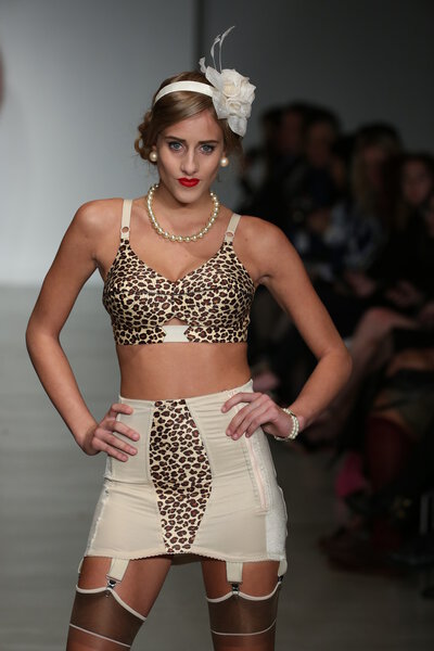 Model walks runway wearing Secrets in Lace lingerie Spring 2015 collection