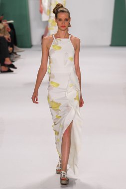 Model Carolin Loosen walk the runway at the Carolina Herrera fashion show
