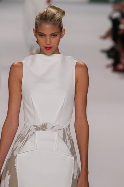 Model Devon Windsor walk the runway at the Carolina Herrera fashion show