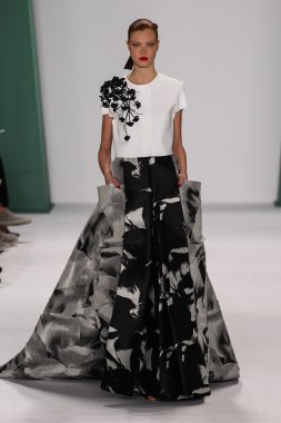 Model Anastasia Ivanova walk the runway at the Carolina Herrera fashion show