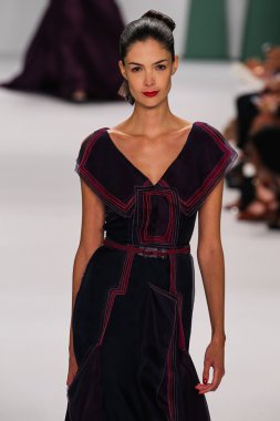 Model Renata Zandonadi walk the runway at the Carolina Herrera fashion show