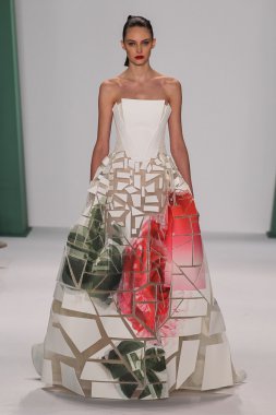Model Auguste Abeliunaite walk the runway at the Carolina Herrera fashion show