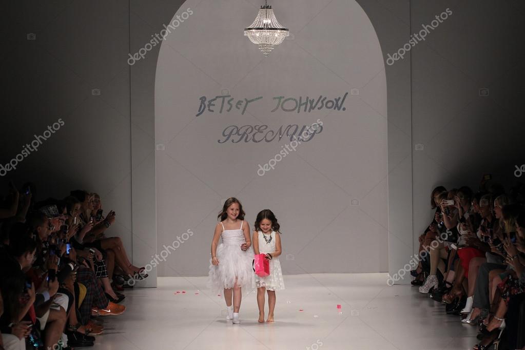 NEW YORK, NY - SEPTEMBER 10: Two child models walk the runway at Betsey Johnson during Mercedes-Benz Fashion Week Spring 2015 at The Salon at Lincoln Center on September 10, 2014 in NYC