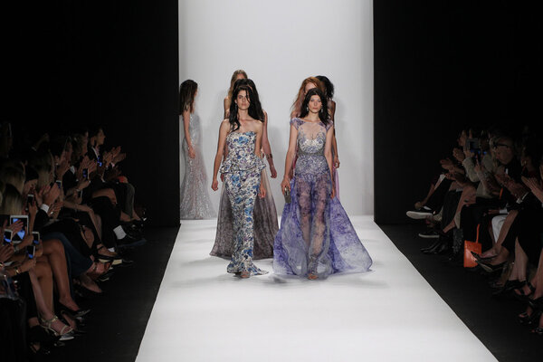 Models walk the runway at the Badgley Mischka fashion show
