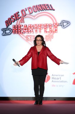 Rosie O'Donnell speaks onstage on the runway