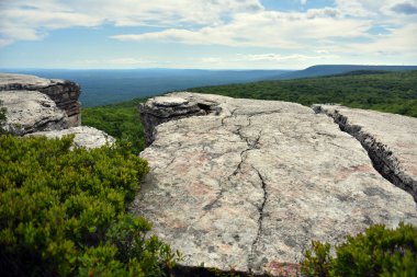 Massive rocks and view to the valley clipart