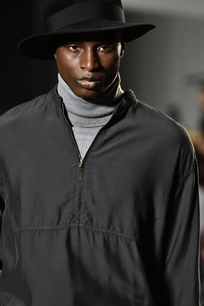 Model walks the runway wearing Robert Geller — Stock Photo, Image