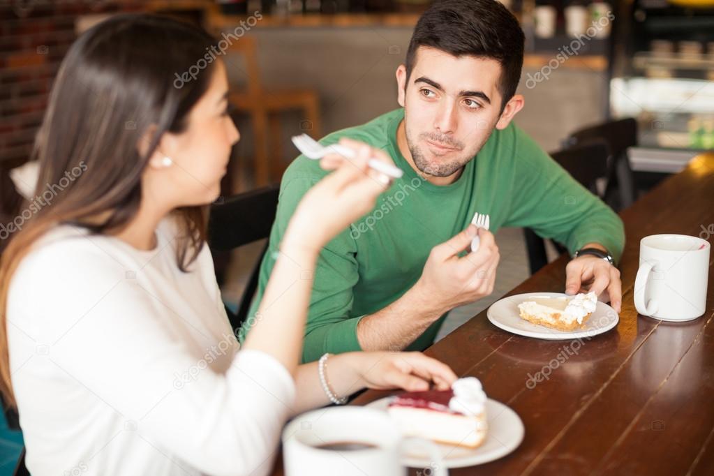 couple eating  pies