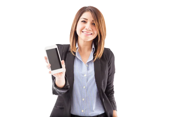 Brunete in a suit holding a smartphone — Stock Photo, Image