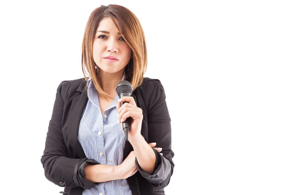 Woman in a suit giving a presentation — Stock Photo, Image