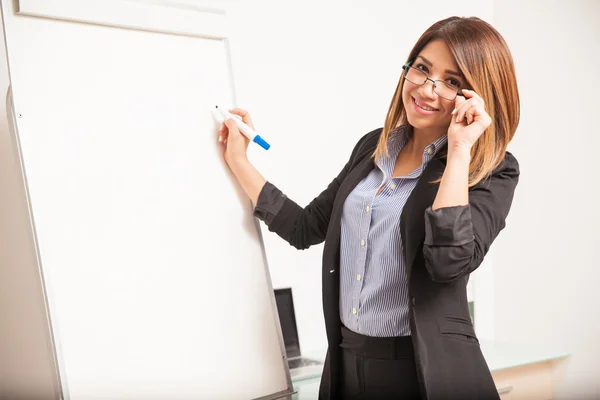 Teacher with glasses teaching — Stock Photo, Image