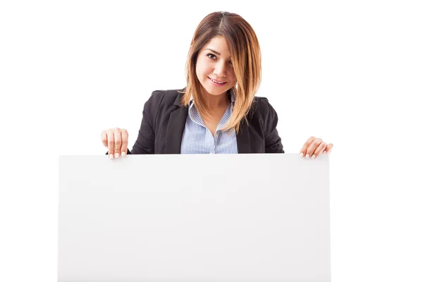 Businesswoman holding a sign — Stock Photo, Image