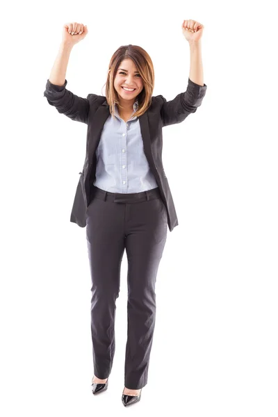 Businesswoman raising her arms — Stock Photo, Image