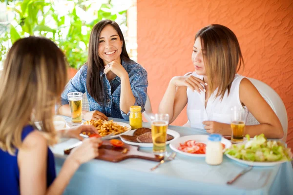 Young women talking at a barbecue — 스톡 사진