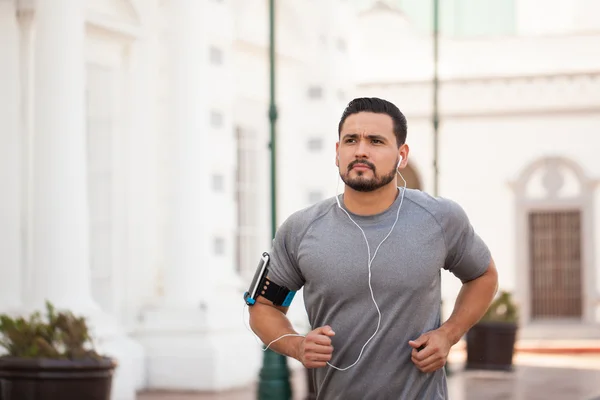 Man jogging outdoors in the city — Stock Photo, Image