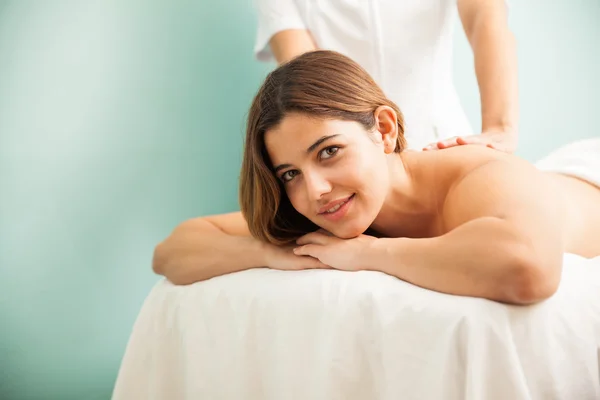 Brunette getting a massage — Stock Photo, Image