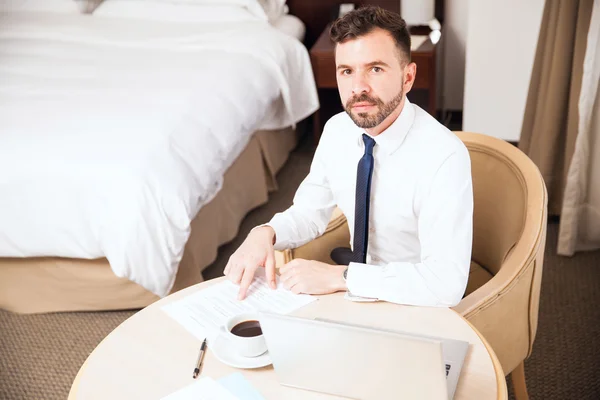 Young businessman  reviewing some documents — Φωτογραφία Αρχείου