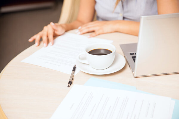 business woman reviewing some documents
