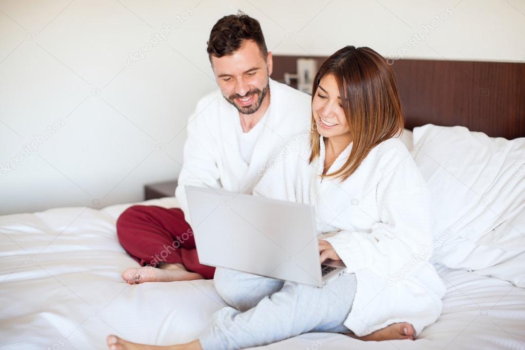 Couple using a laptop computer 