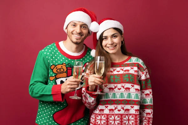 Portrait Good Looking Latin Couple Ugly Sweaters Holding Glass Champagne — Stock Photo, Image