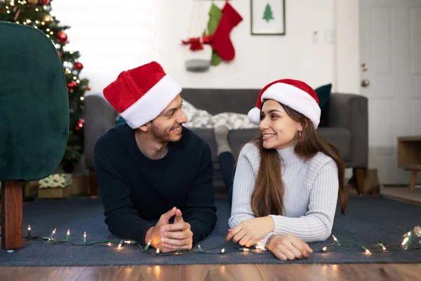 Boyfriend Girlfriend Looking Each Other While Lying Floor Home Christmas — Stock Photo, Image