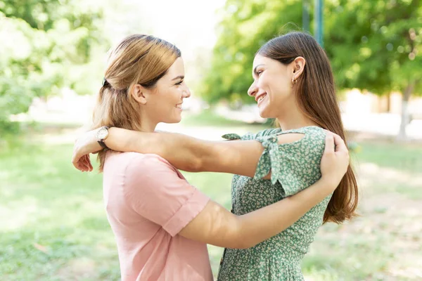 Multiracial Gay Couple Hugging Making Eye Contact Park — Stock Photo, Image