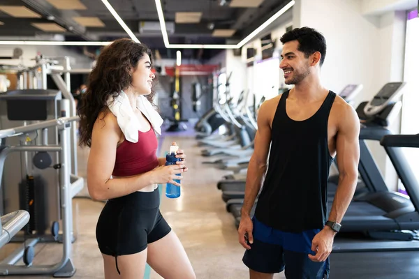 Handsome Latin Couple Talking Flirting Drinking Water Workouts Fitness Center — Stock Photo, Image