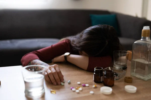 Drunk Hispanic Young Woman Passed Out Table Surrounded Alcohol Drugs — Stock Photo, Image