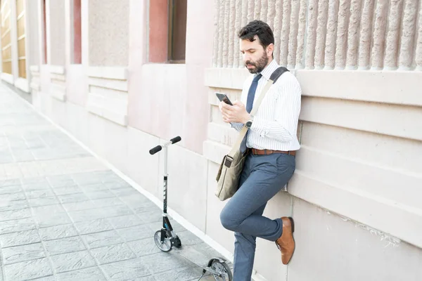 Side View Hispanic Adult Man Using Smartphone Next His Scooter — Stock Photo, Image