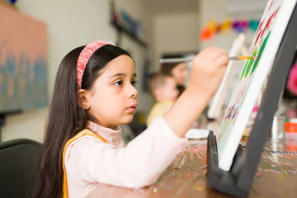 Profile Beautiful Hispanic Elementary Girl Focused Expression Doing Painting Paintbrush — Stock Photo, Image