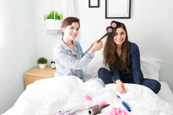 Portrait Two Happy Women Friends Doing Hair Bed Sleepover Latin — Stock Photo, Image