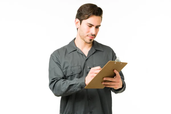 Busy Young Man Working His Job Writing Clipboard Attractive Handyman — Stock Photo, Image