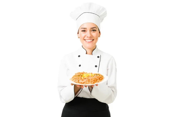 Portrait Attractive Female Chef Smiling While Showing Plate Spaghetti She — Stock Photo, Image