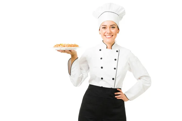 Cheerful Chef White Uniform Showing Dinner Plate Beautiful Young Woman — Stock Photo, Image