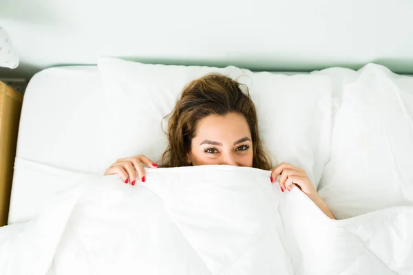 Top View Playful Woman Covering Her Face White Duvet Beautiful — Stock Photo, Image