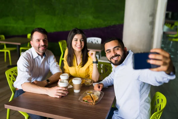 Attractive Friends Workers Taking Selfie Smartphone While Sitting Together Table — Stock Photo, Image