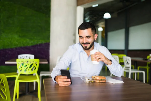 Attractive Young Man Drinking Coffee Eating Sandwich Work Cafeteria His — Stock Photo, Image