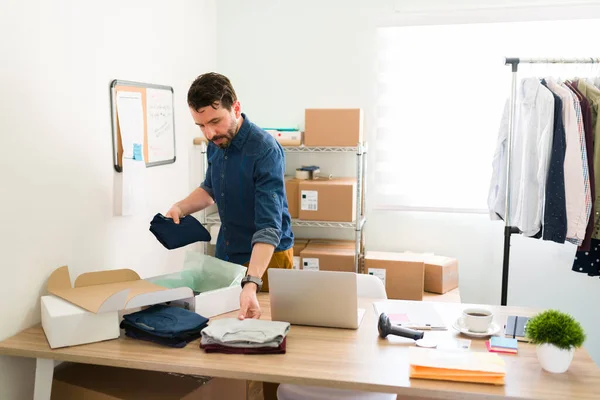 Online Clothing Store Growing Handsome Business Owner Putting Shirts Boxes — Foto de Stock