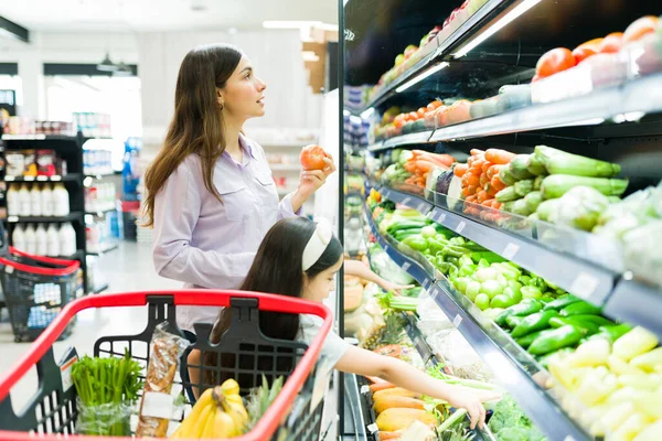 Fresh Products Market Young Woman Choosing Best Vegetables Her Little — Stock Photo, Image