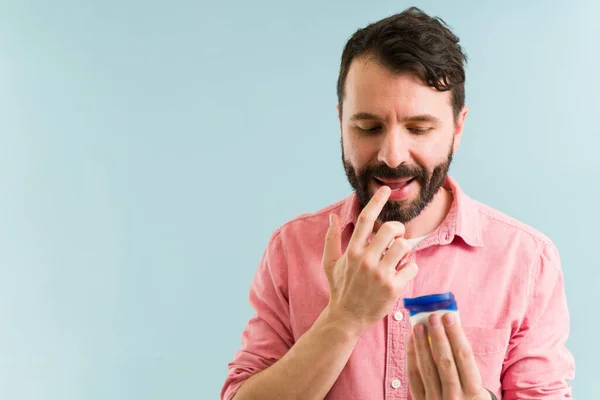 Healthy Man Putting Lip Balm His Mouth Attractive Man His — Stock Photo, Image