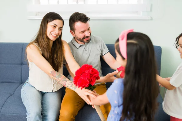 Thankful Cute Little Daughter Giving Bouquet Flowers Her Attractive Happy — Zdjęcie stockowe